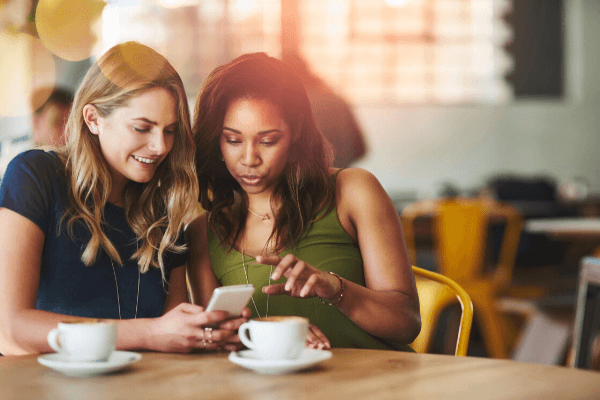 Women connecting and talking at coffee shop
